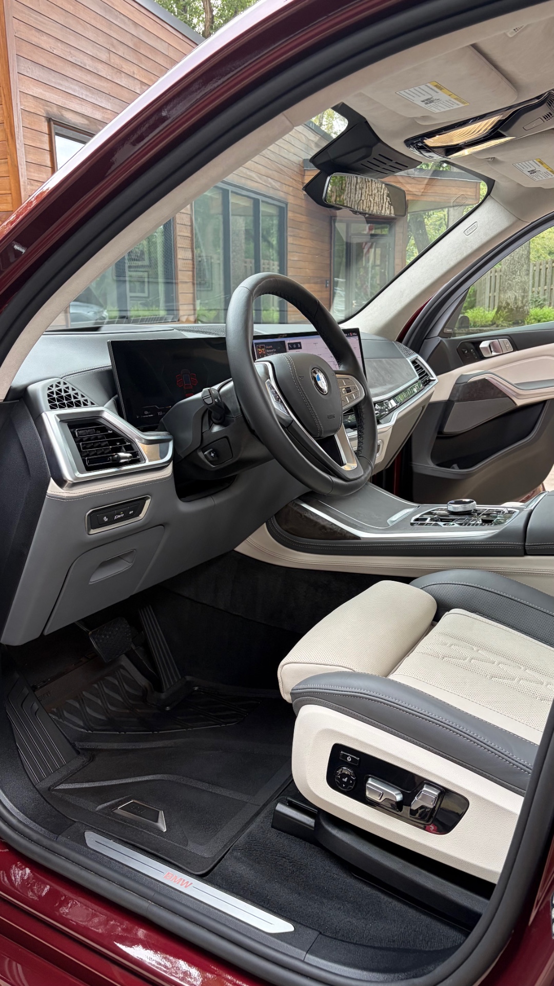 Ivory White interior cabin of a BMW Individual X7 after detailing