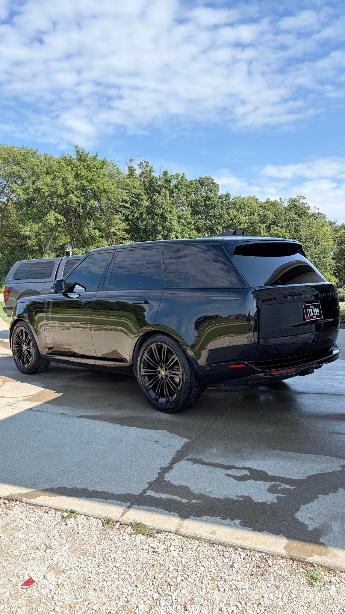 Black Range Rover rear three-quarter after a full detail in West Des Moines