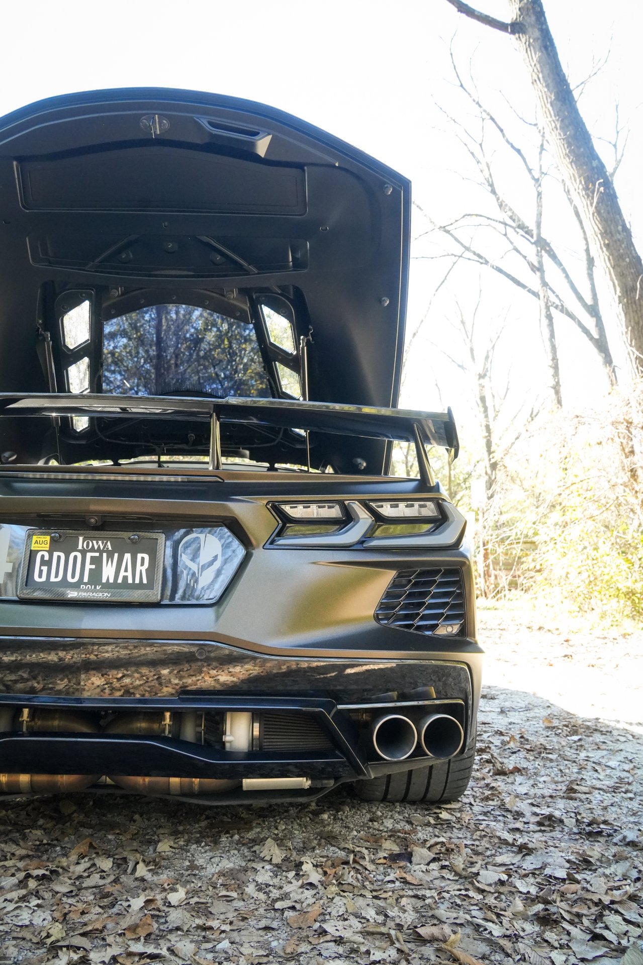 Black twin turbo Corvette C8 rear showing the twin turbo setup after a Premium Full Detail in Johnston