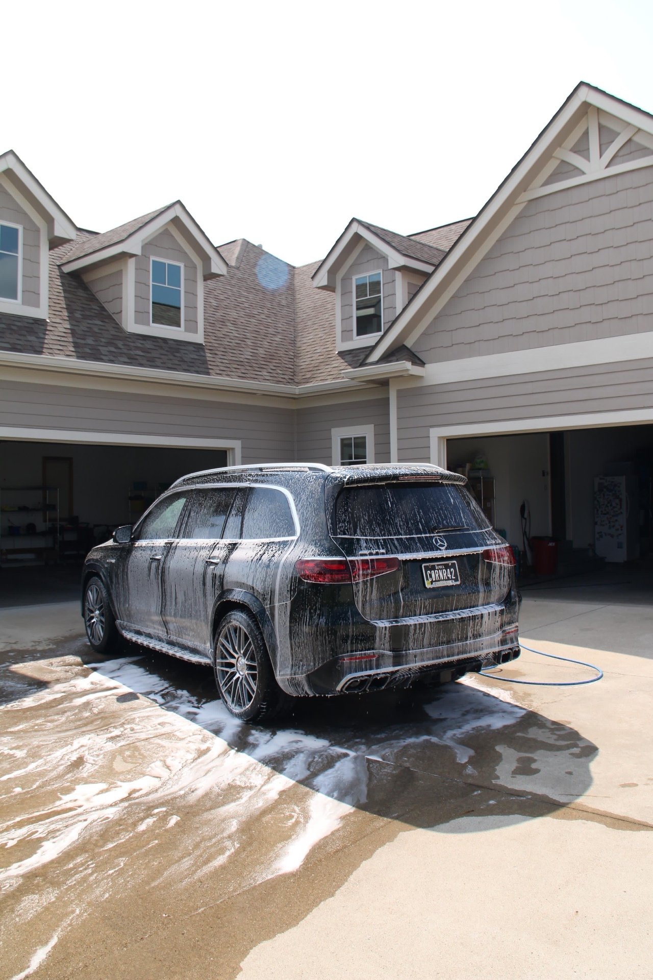Pre-wash foam applied to a Mercedes-AMG GLS 63 during a mobile detail