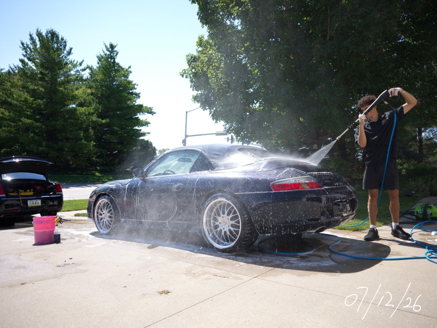 Foam pre-soak on a Porsche 911 Carrera Cabriolet during a hand wash