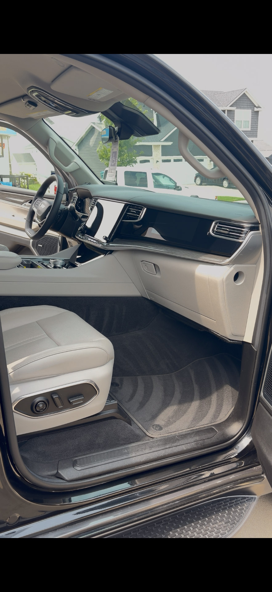 Dashboard of a matte wrap Jeep Grand Wagoneer cleaned by Street Standard Detailing