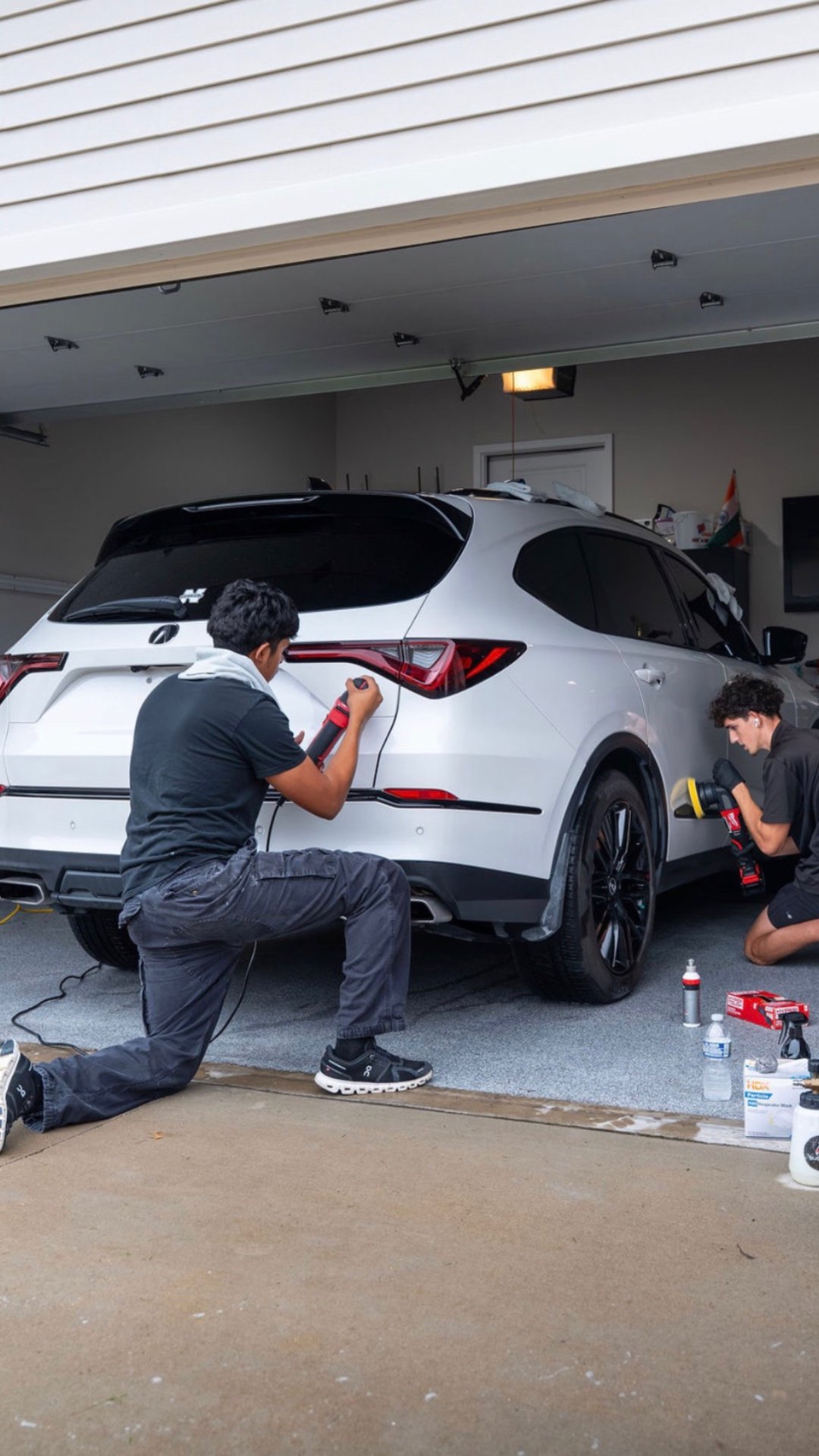 Machine polishing the Acura MDX before coating