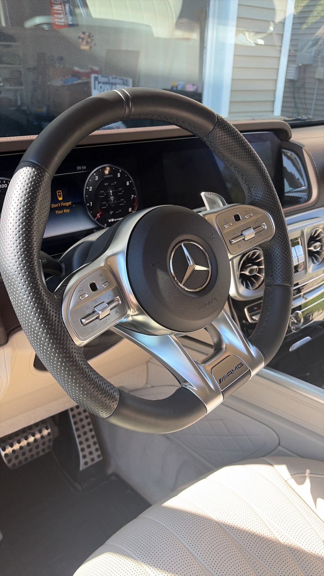 Mercedes-AMG G63 steering wheel and controls cleaned during an interior detail