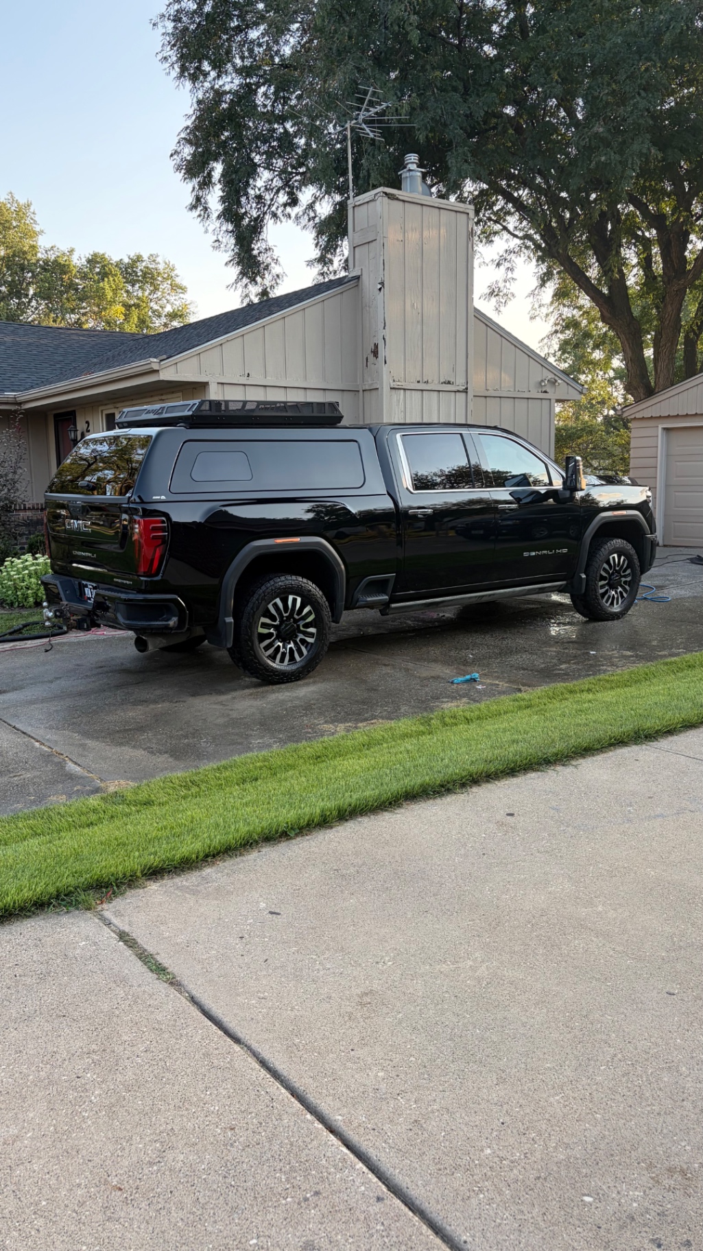 Rear quarter view of a detailed GMC Sierra 2500 Denali Ultimate