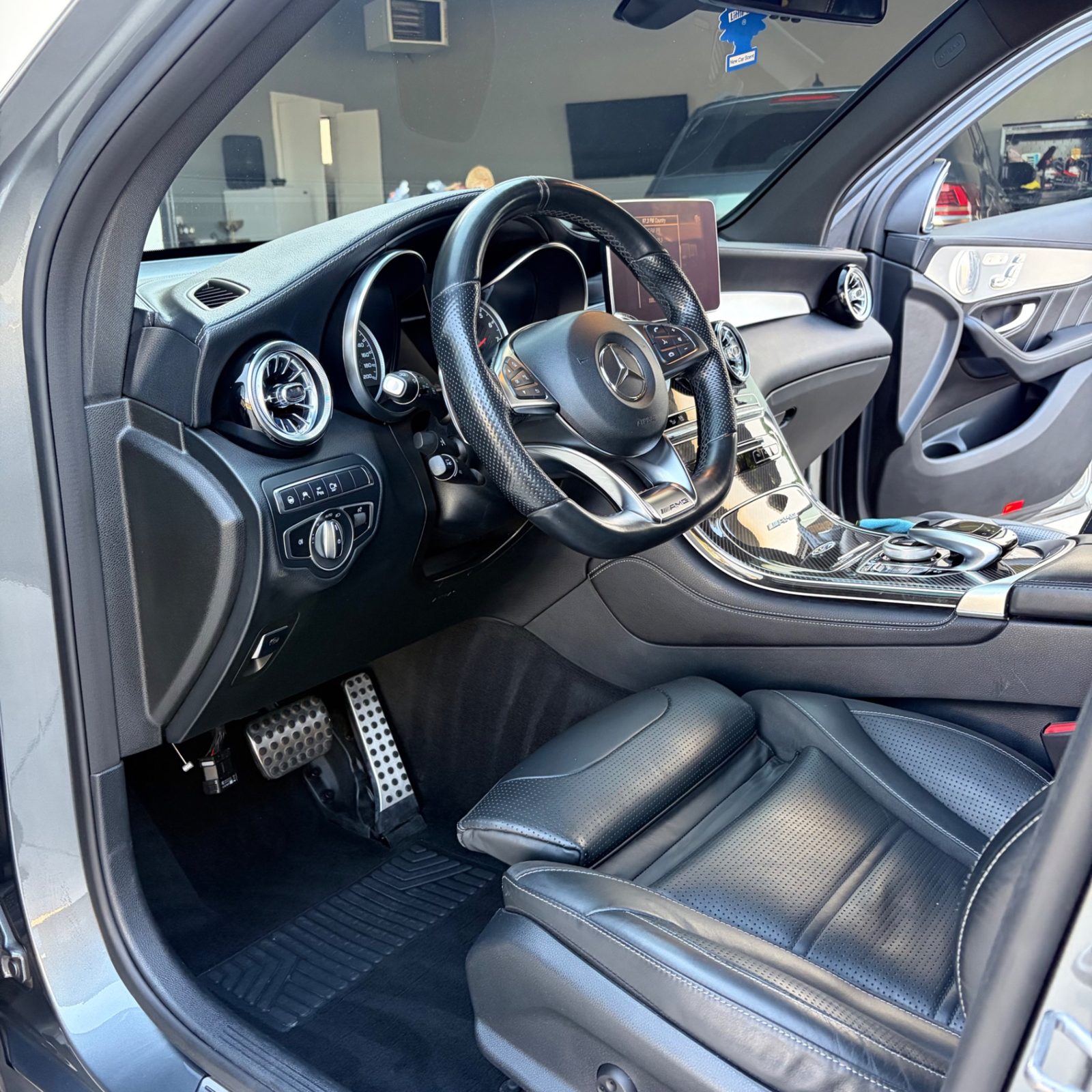 Detailed driver seat and dashboard of the Mercedes-AMG GLC 63
