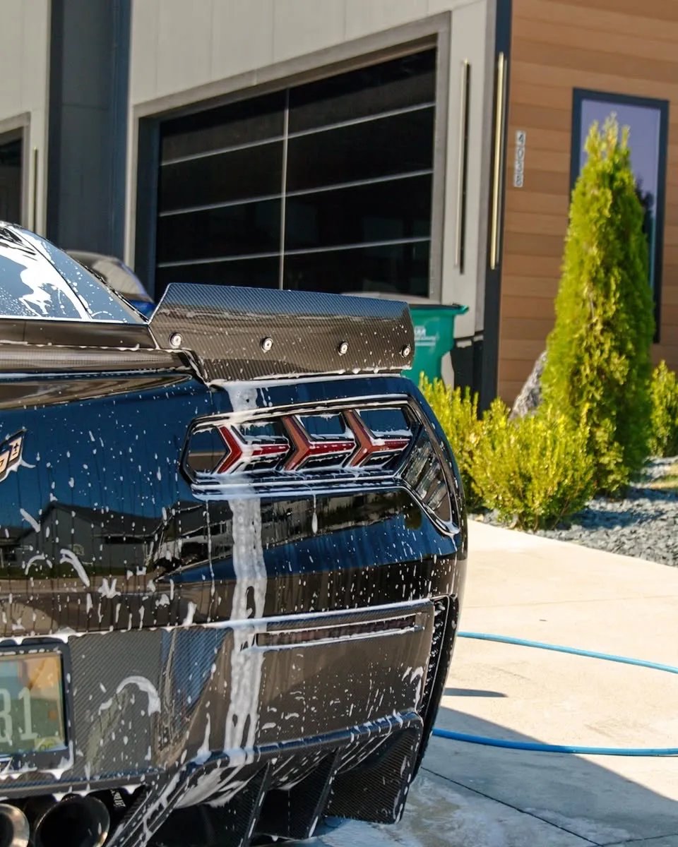 Black 1,084 HP Corvette C7 Z06 rear foam pre-wash during the exterior detail