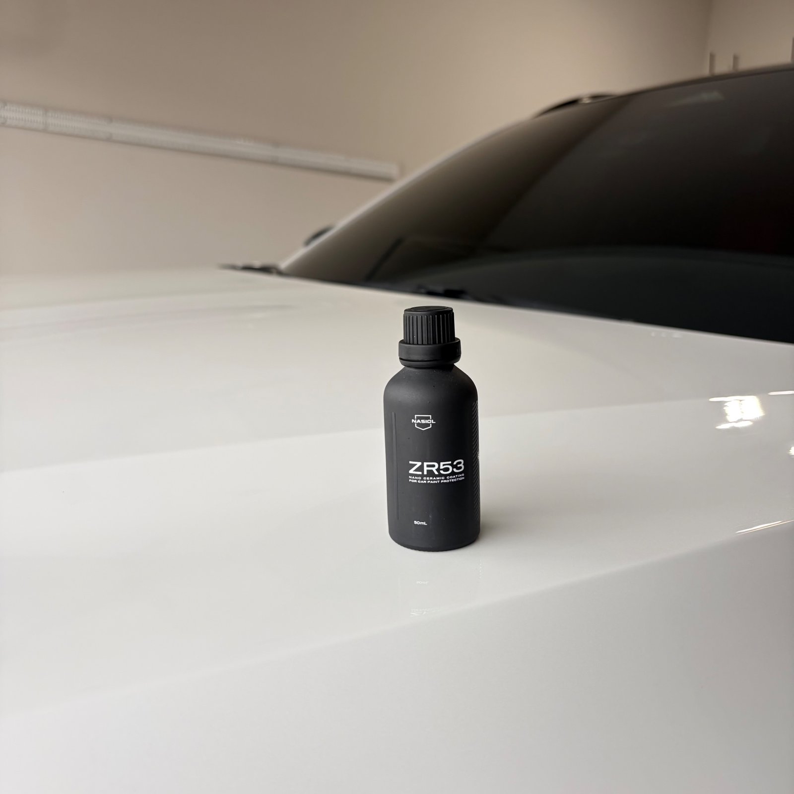 Nasiol ZR53 bottle on the hood during the Acura MDX coating job