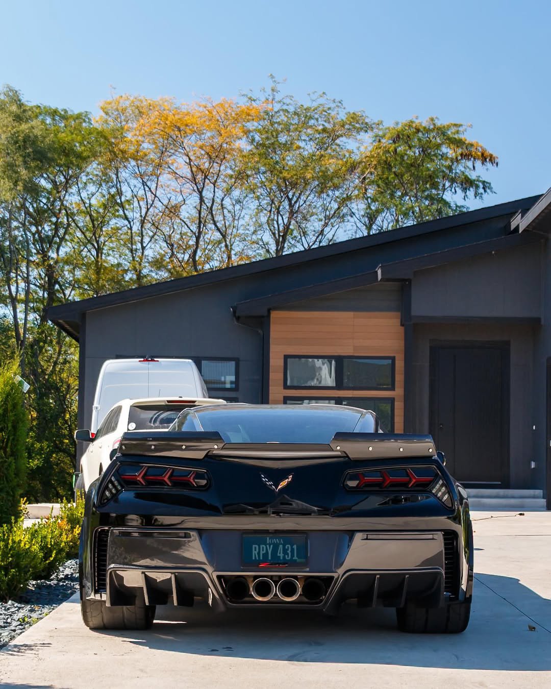 Black 1,084 HP Corvette C7 Z06 rear after an exterior detail in Clive