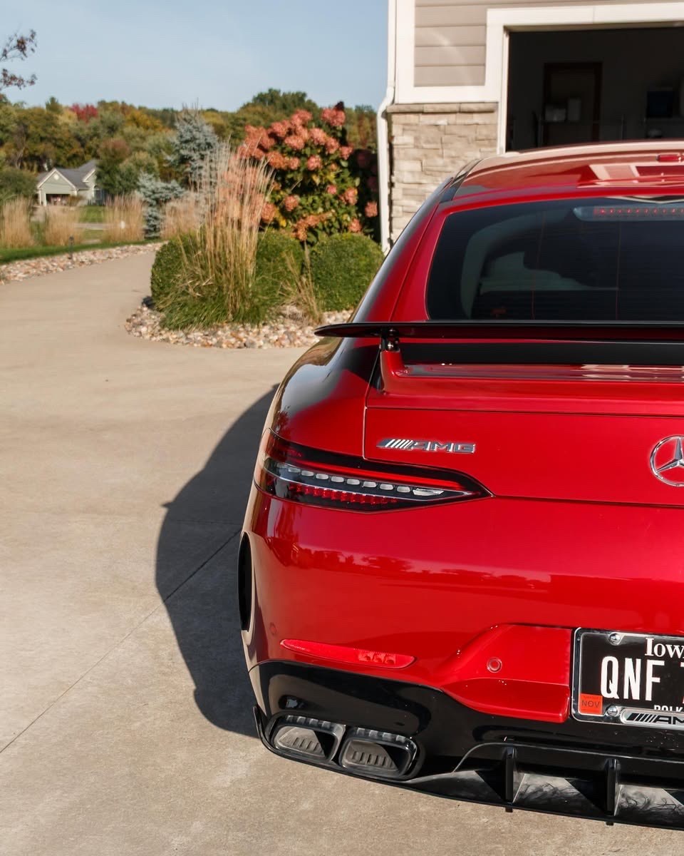 Red Mercedes-AMG GT 63 S rear badge, spoiler and exhaust detail