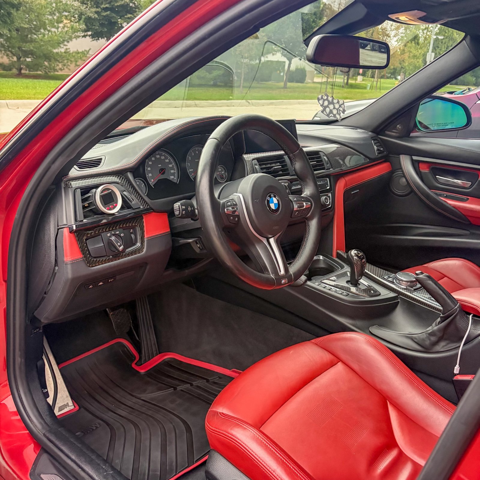 Driver side interior of the BMW M3 after the full detail