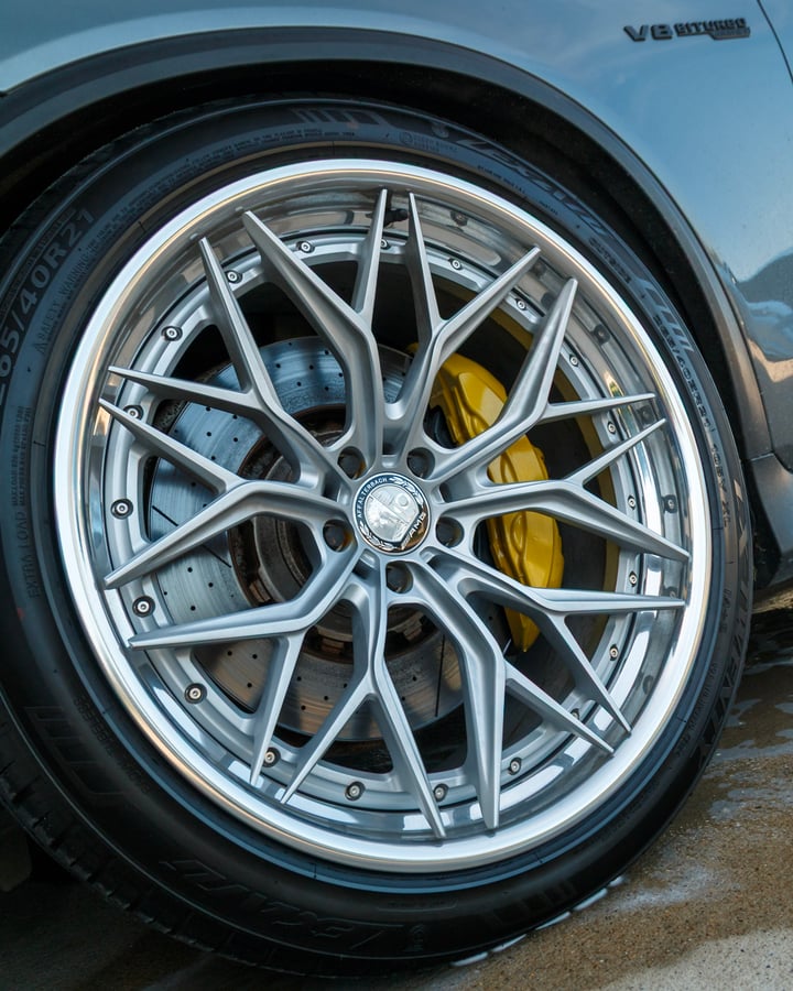 Forged wheel and yellow caliper close-up photographed by Kenny