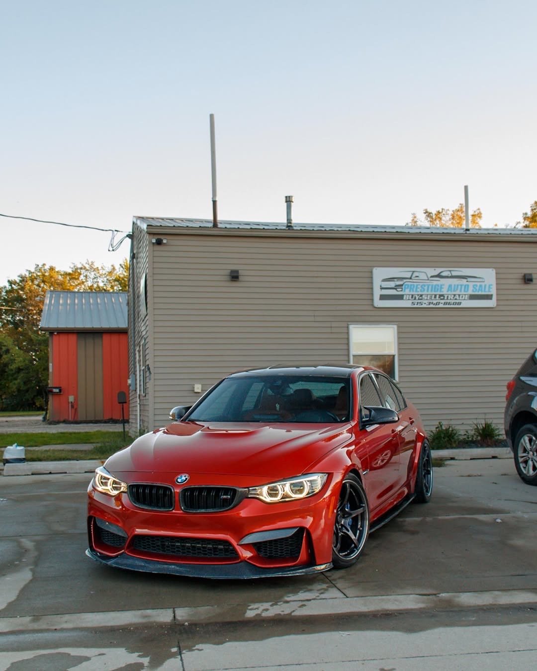 Red BMW F80 M3 after its maintenance detail in Waukee