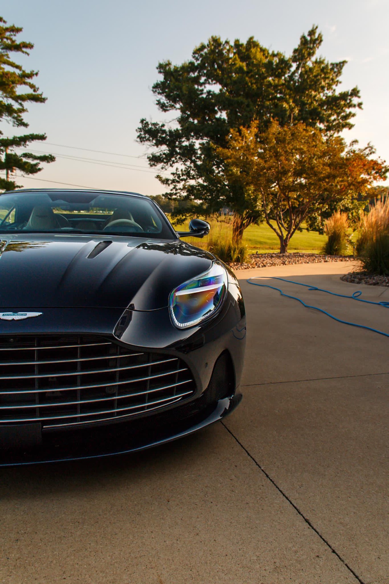 Headlight detail on an Aston Martin DB12 Volante