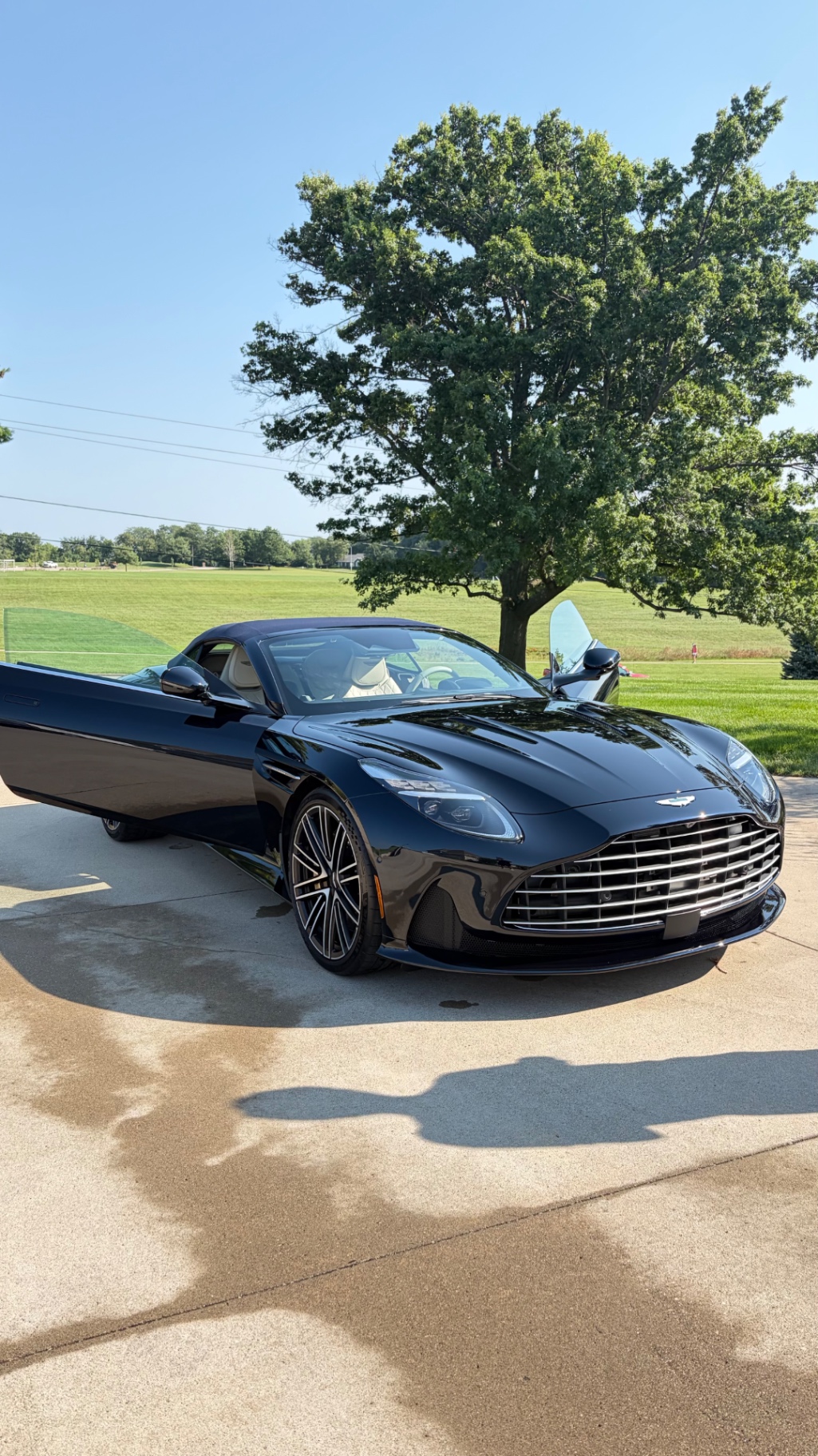 Front quarter view of a detailed Aston Martin DB12 Volante