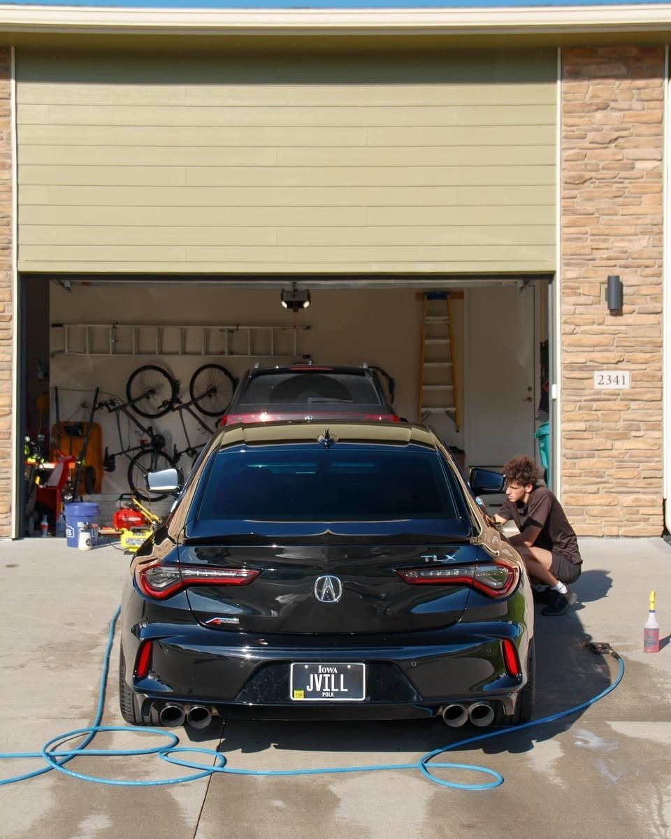 Jake working on the black Acura TLX in Altoona