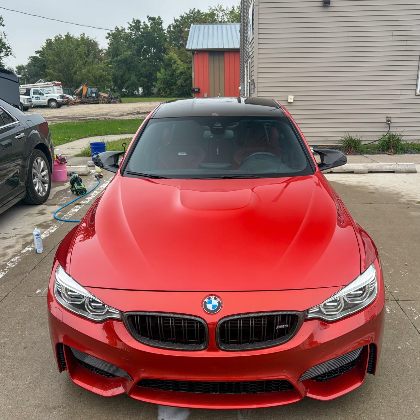 Front of the BMW M3 after a full detail in Waukee