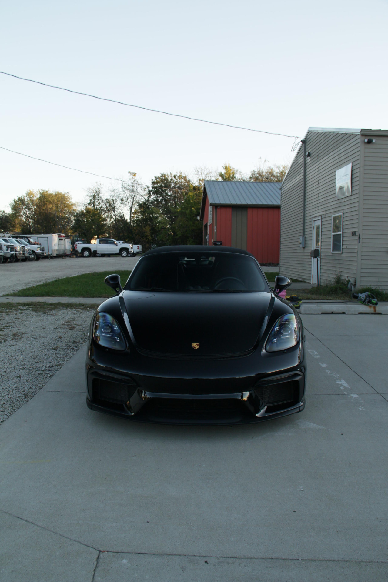 Black Porsche 718 Spyder front view after its Waukee exterior detail