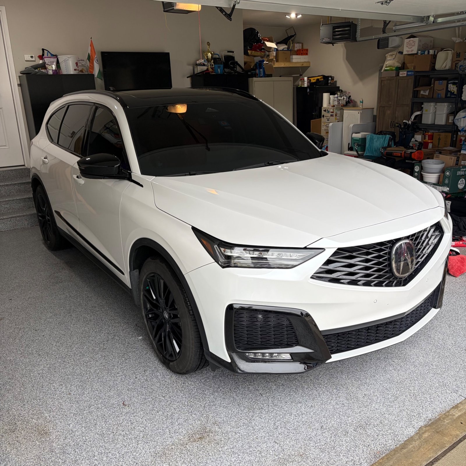 White Acura MDX in the garage after Nasiol ZR53 ceramic coating