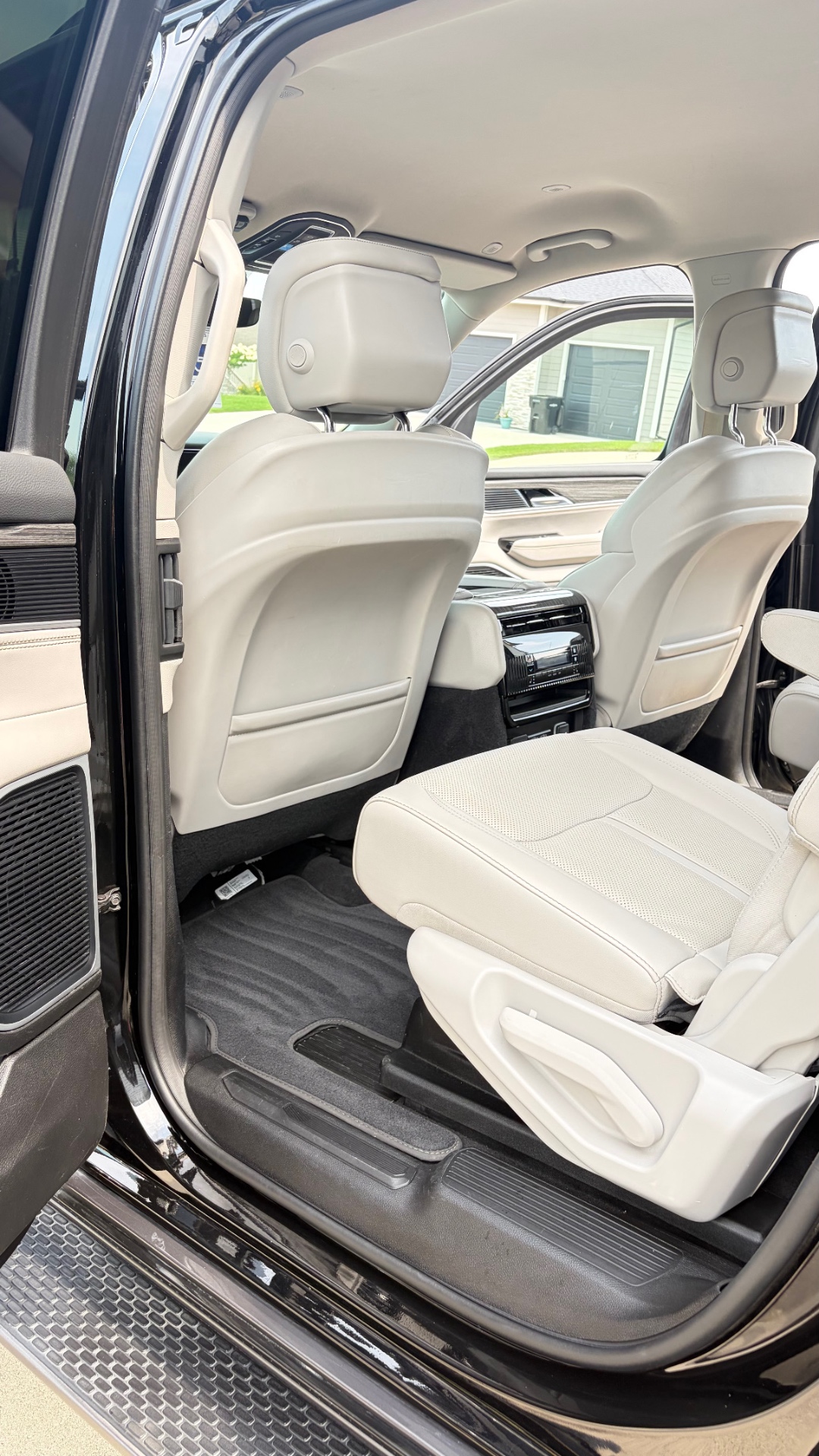 Rear seats of a matte wrap Jeep Grand Wagoneer after a full interior detail