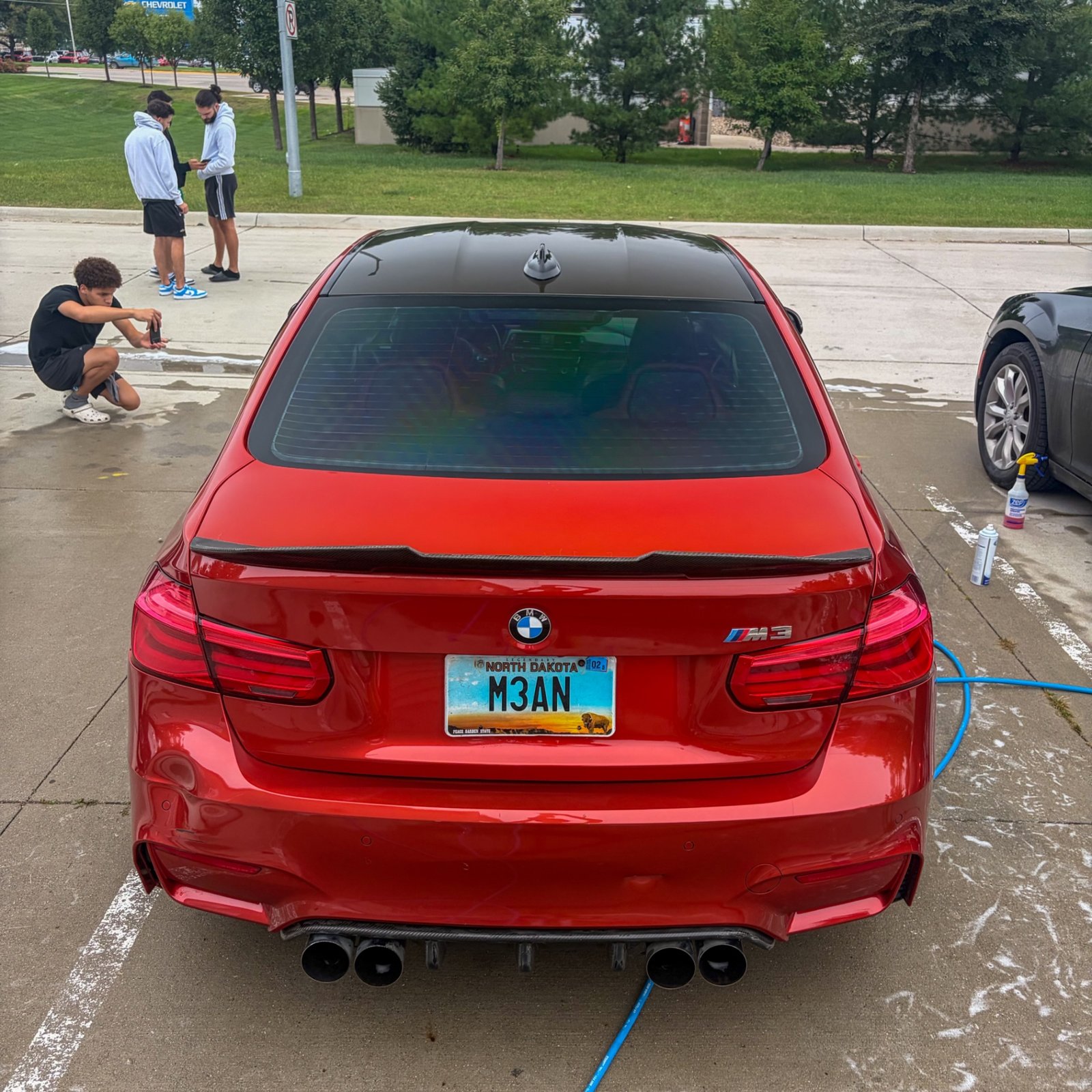 Rear of the BMW M3 after a full detail in Waukee