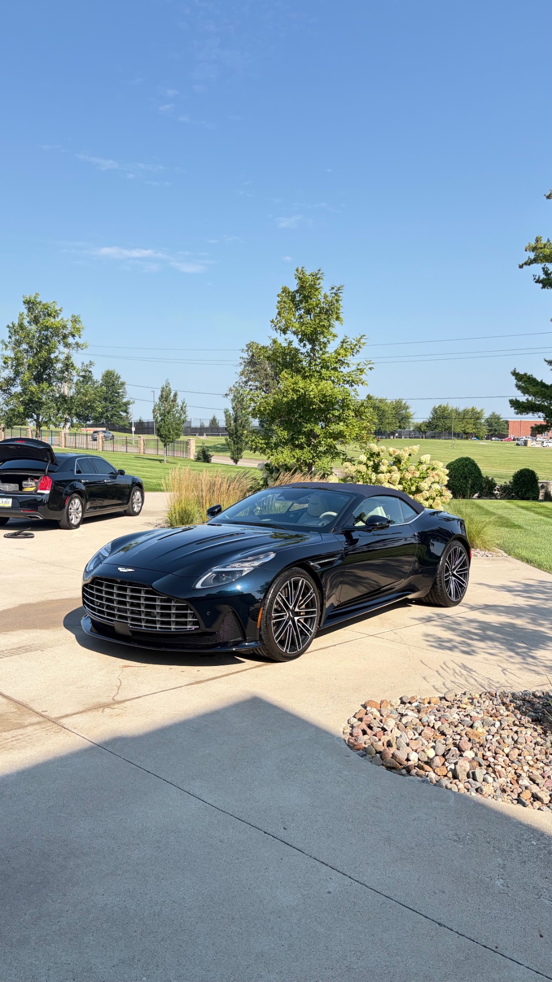 Side profile of an Aston Martin DB12 Volante detailed in central Iowa