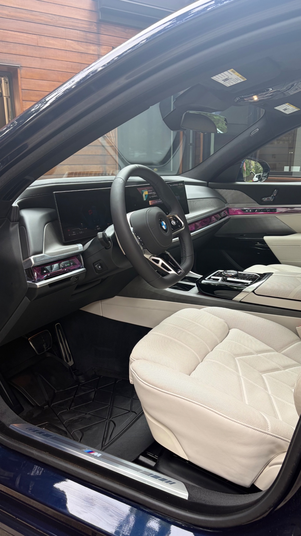 Ivory White interior cabin of a BMW Individual M760i after detailing