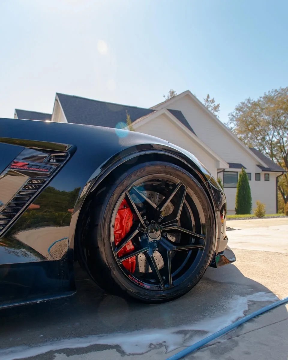 Black 1,084 HP Corvette C7 Z06 wheel and red caliper after wheel cleaning