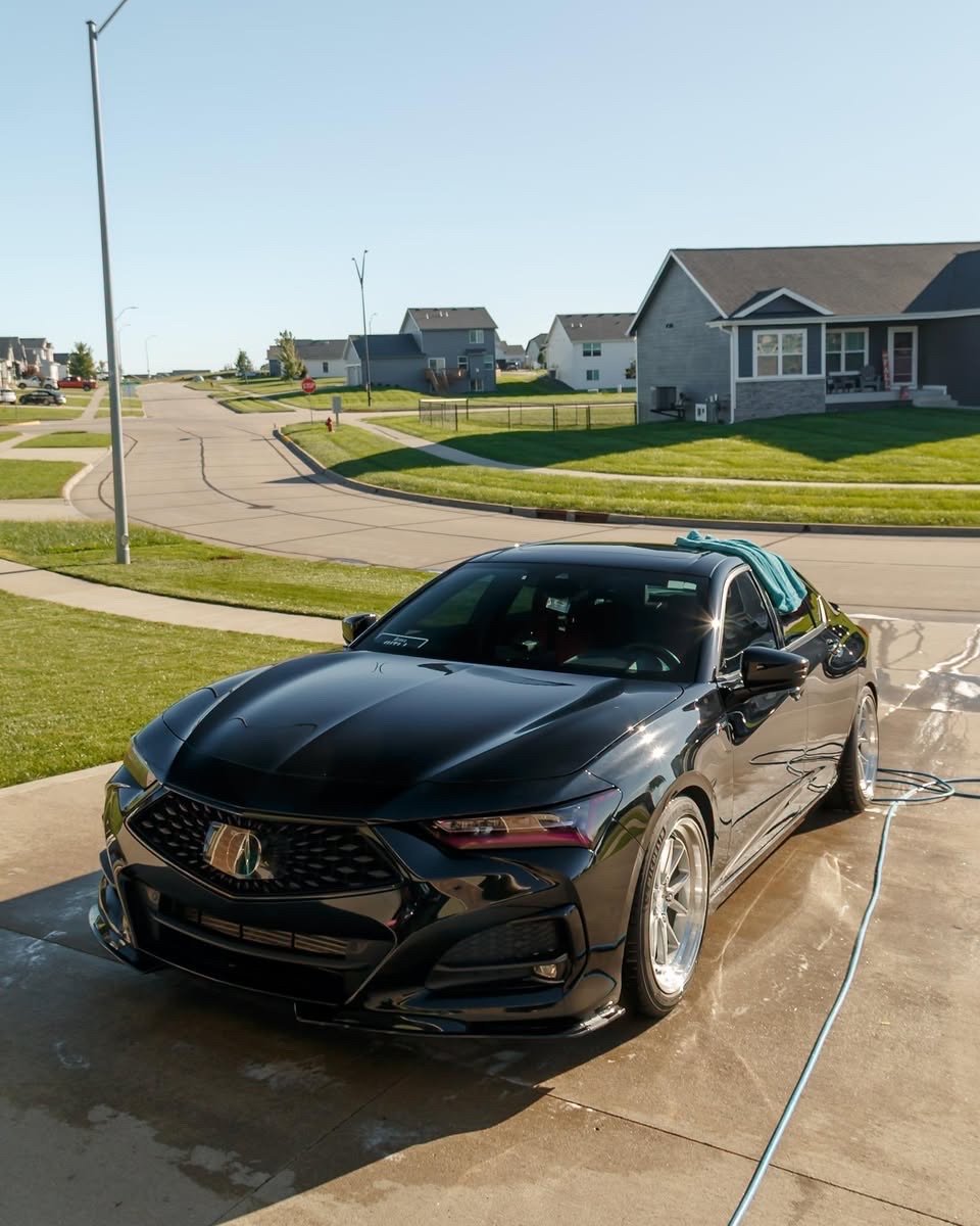 Black Acura TLX A-Spec during an exterior detail in Altoona