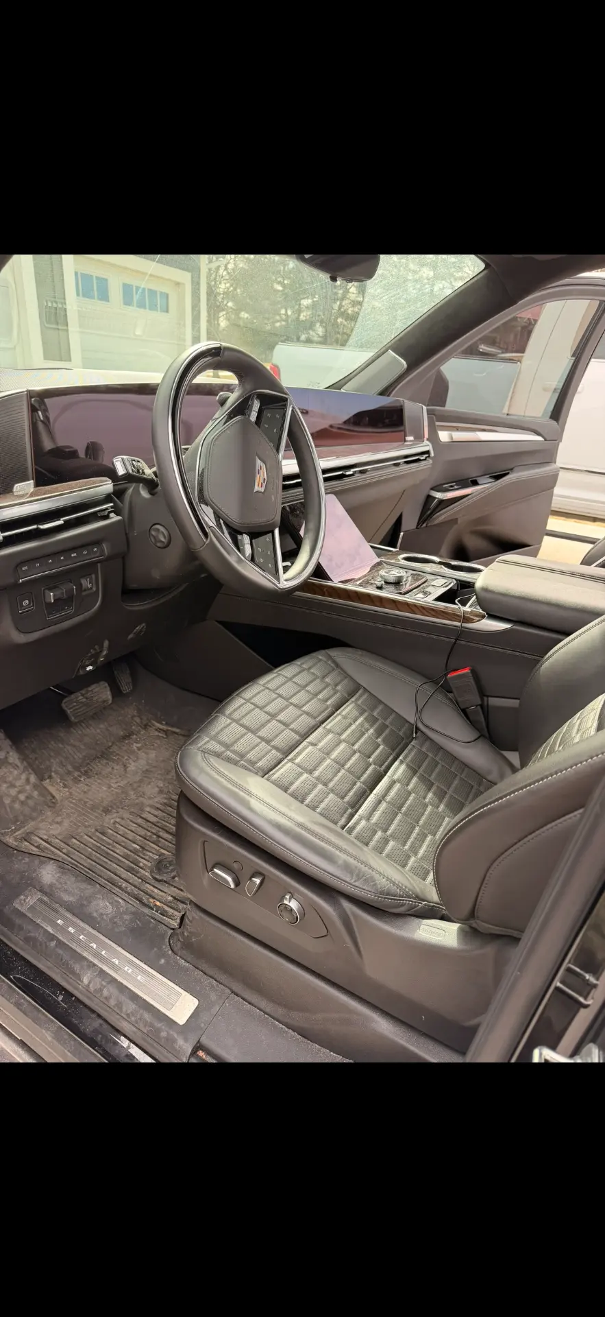 Cadillac Escalade — Interior Detail — Floorboards, trim & leather refresh by Street Standard Detailing, mobile detailing in Altoona and Central Iowa — before