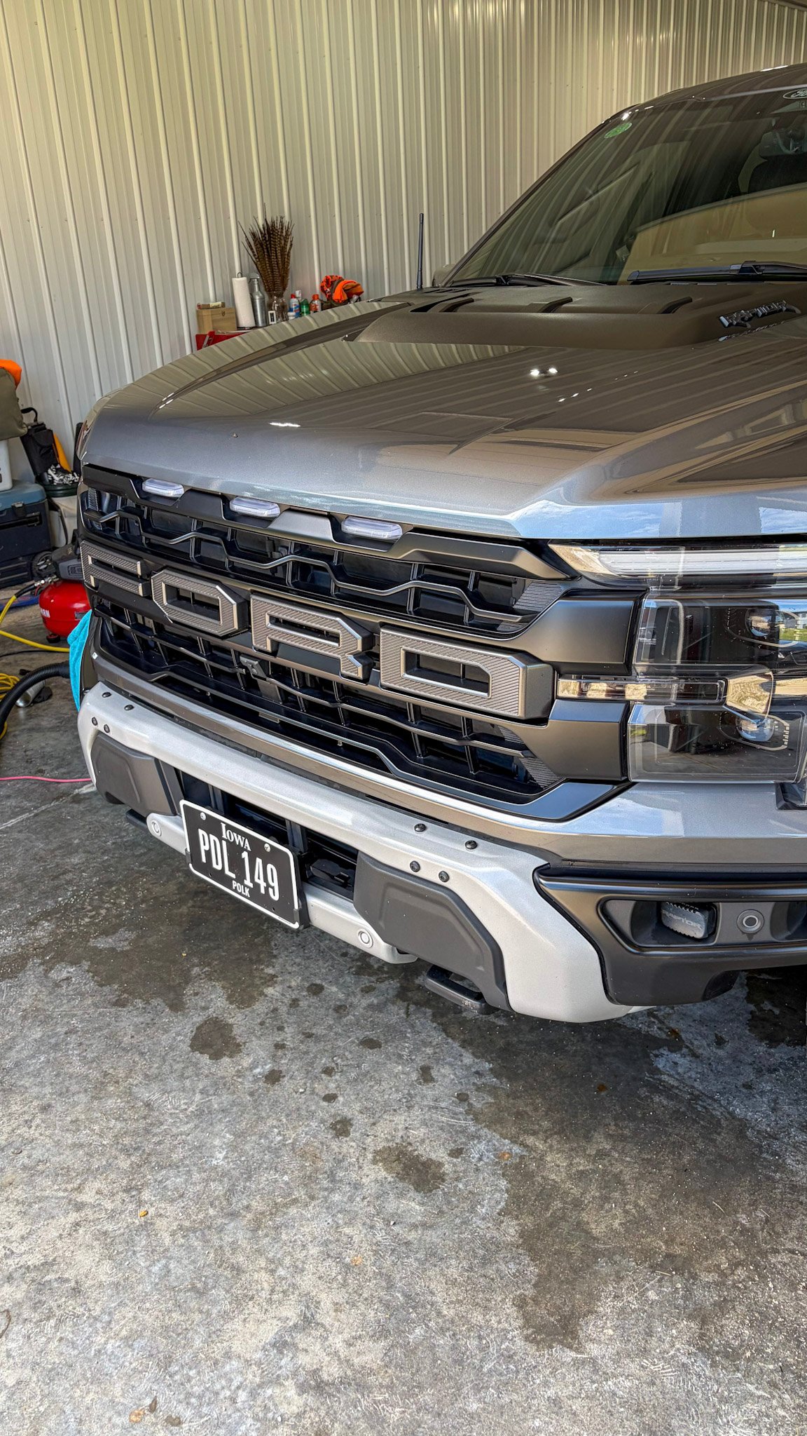 Gray Ford Raptor front grille after a full detail in West Des Moines