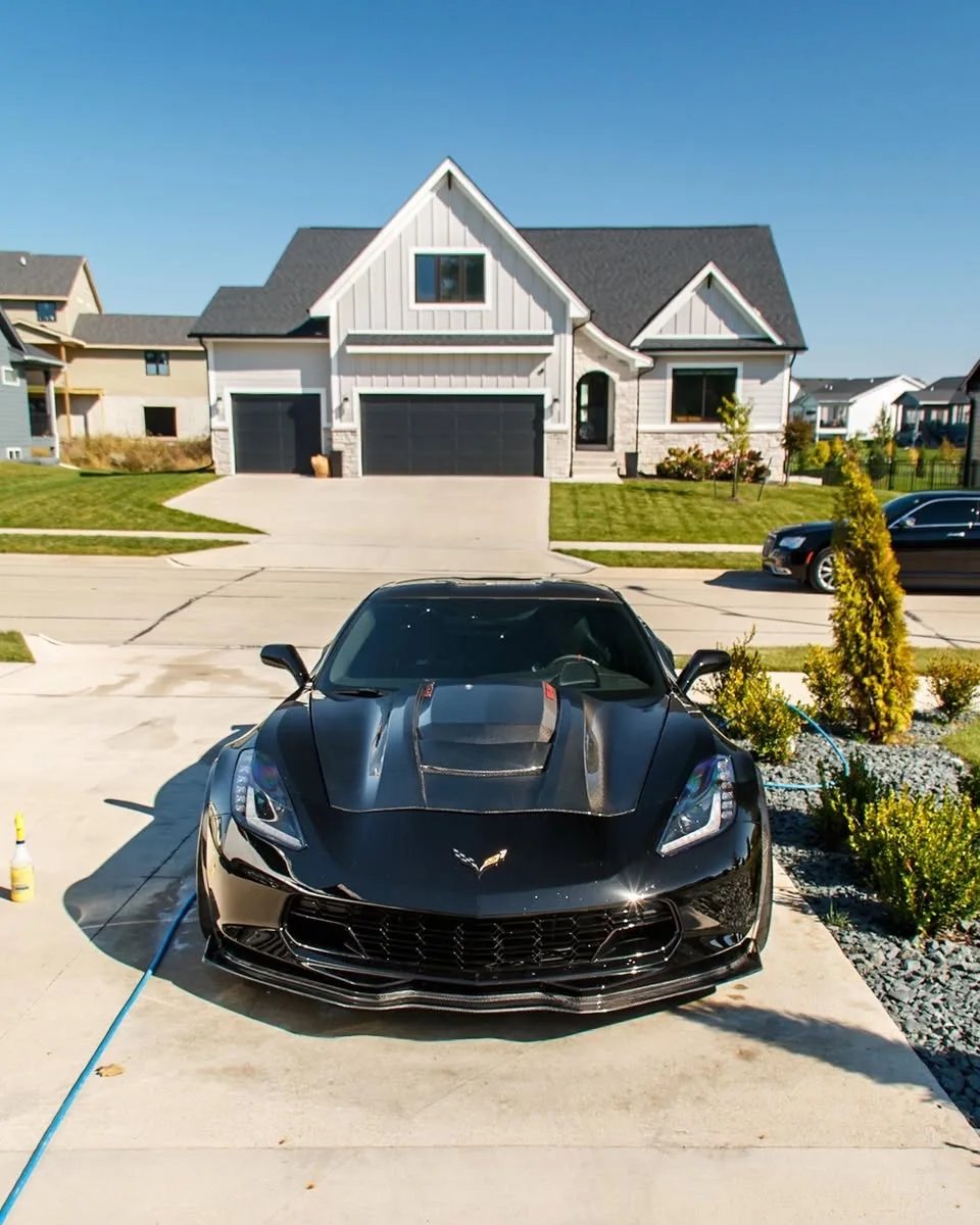 Black 1,084 HP Corvette C7 Z06 front view after an exterior detail in Clive