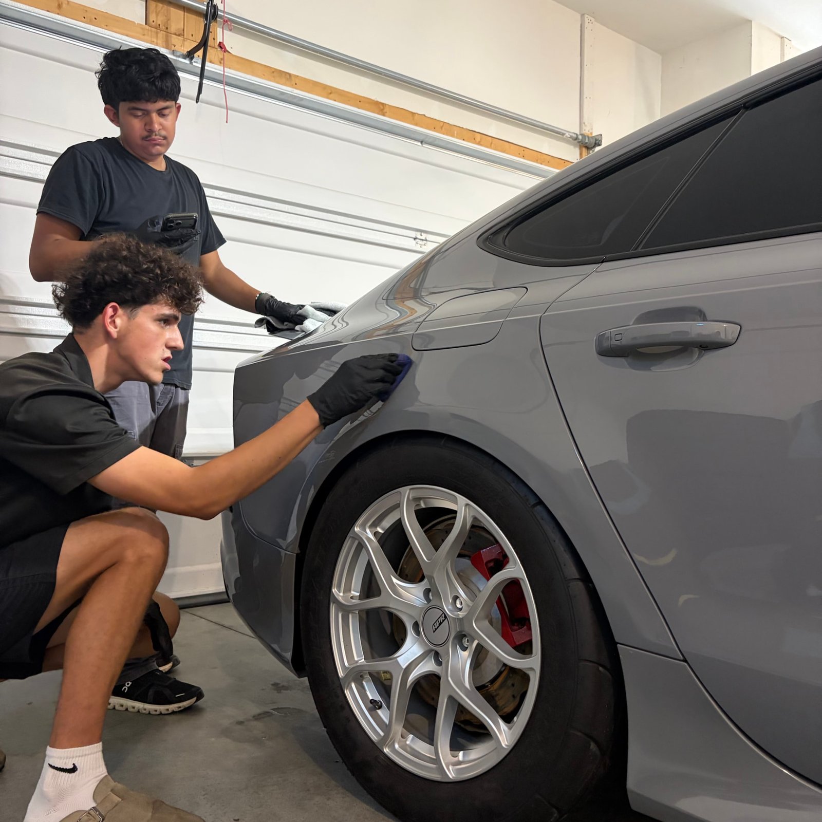 Jake applying GYEON Q² MOHS EVO to a Nardo Grey Audi RS7