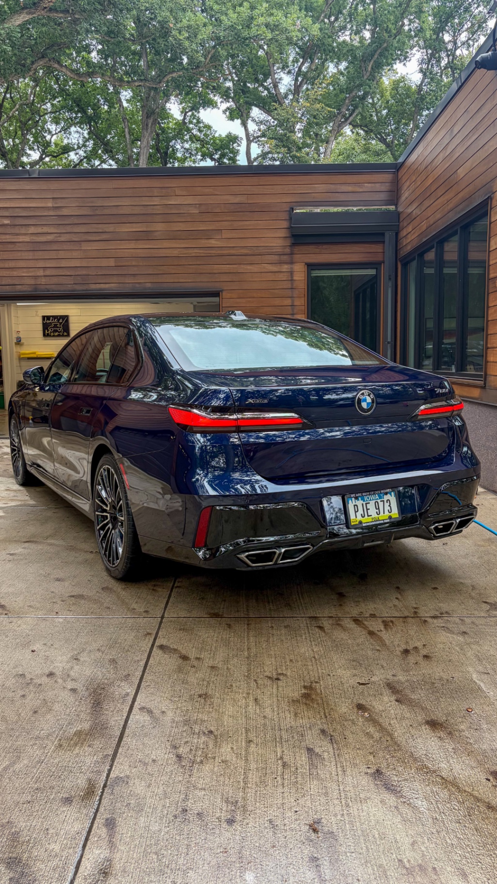 Rear quarter of a BMW M760i xDrive after detailing