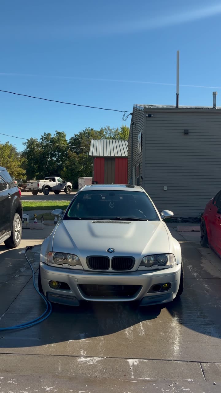 BMW E46 M3 rinsed during the exterior detail