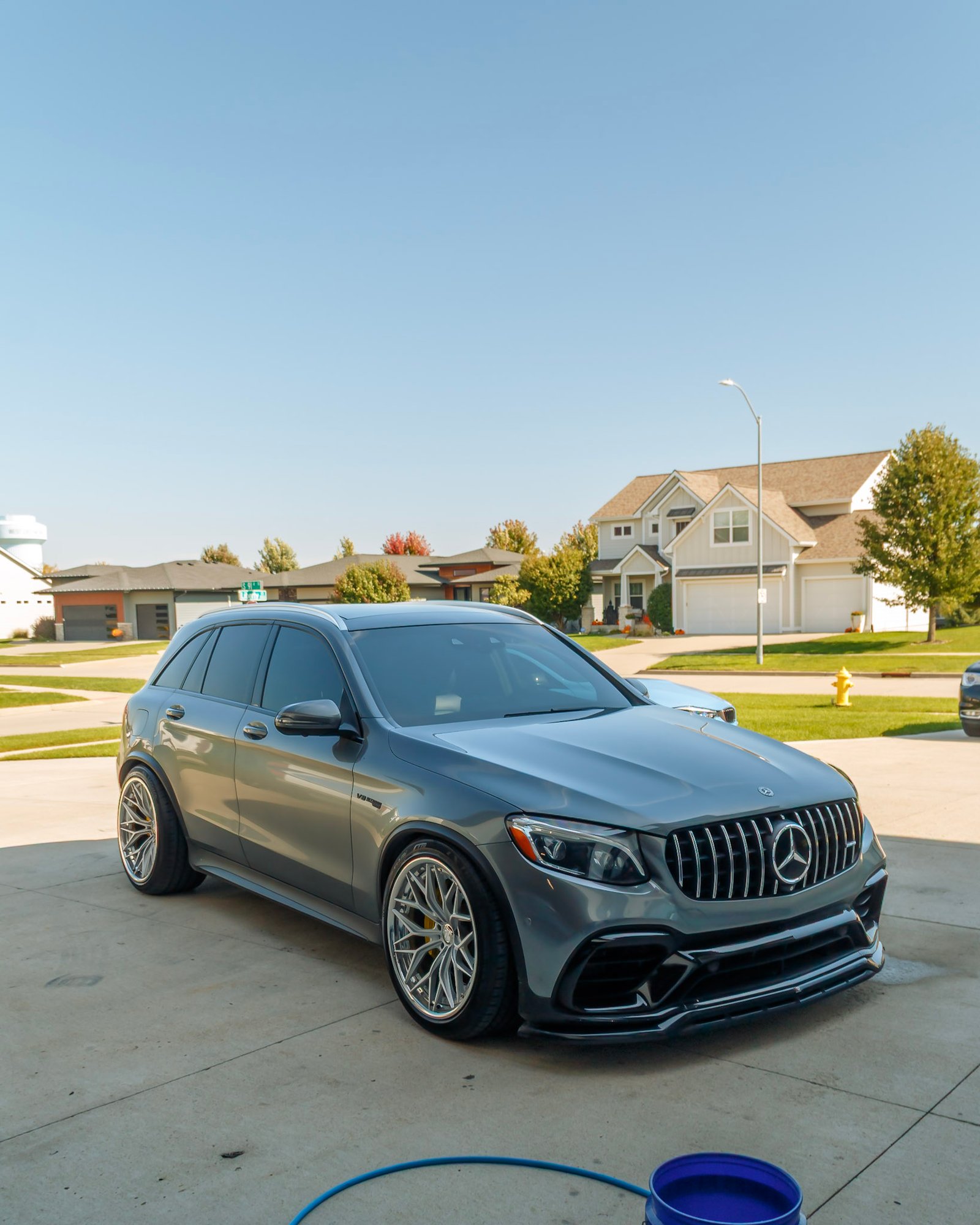 Grey Mercedes-AMG GLC 63 on AL13 wheels, front three-quarter after a Full Detail in West Des Moines