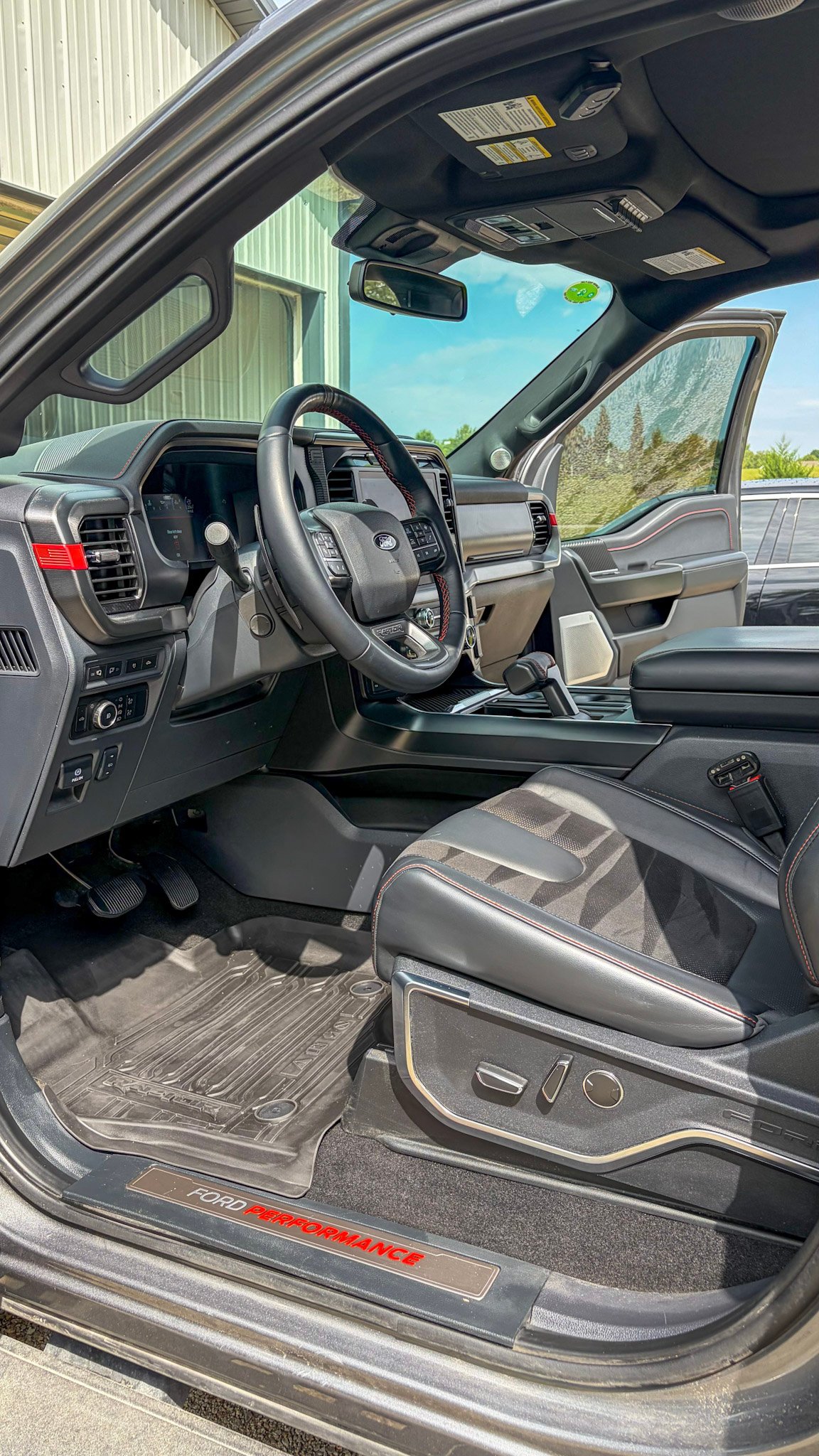 Ford Raptor driver side interior after a full detail in West Des Moines