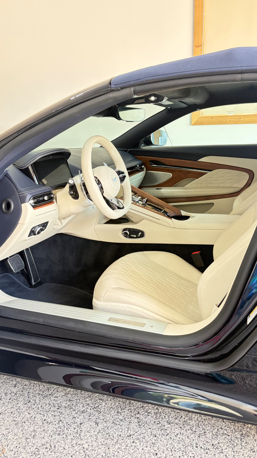 Interior cabin of an Aston Martin DB12 Volante after detailing
