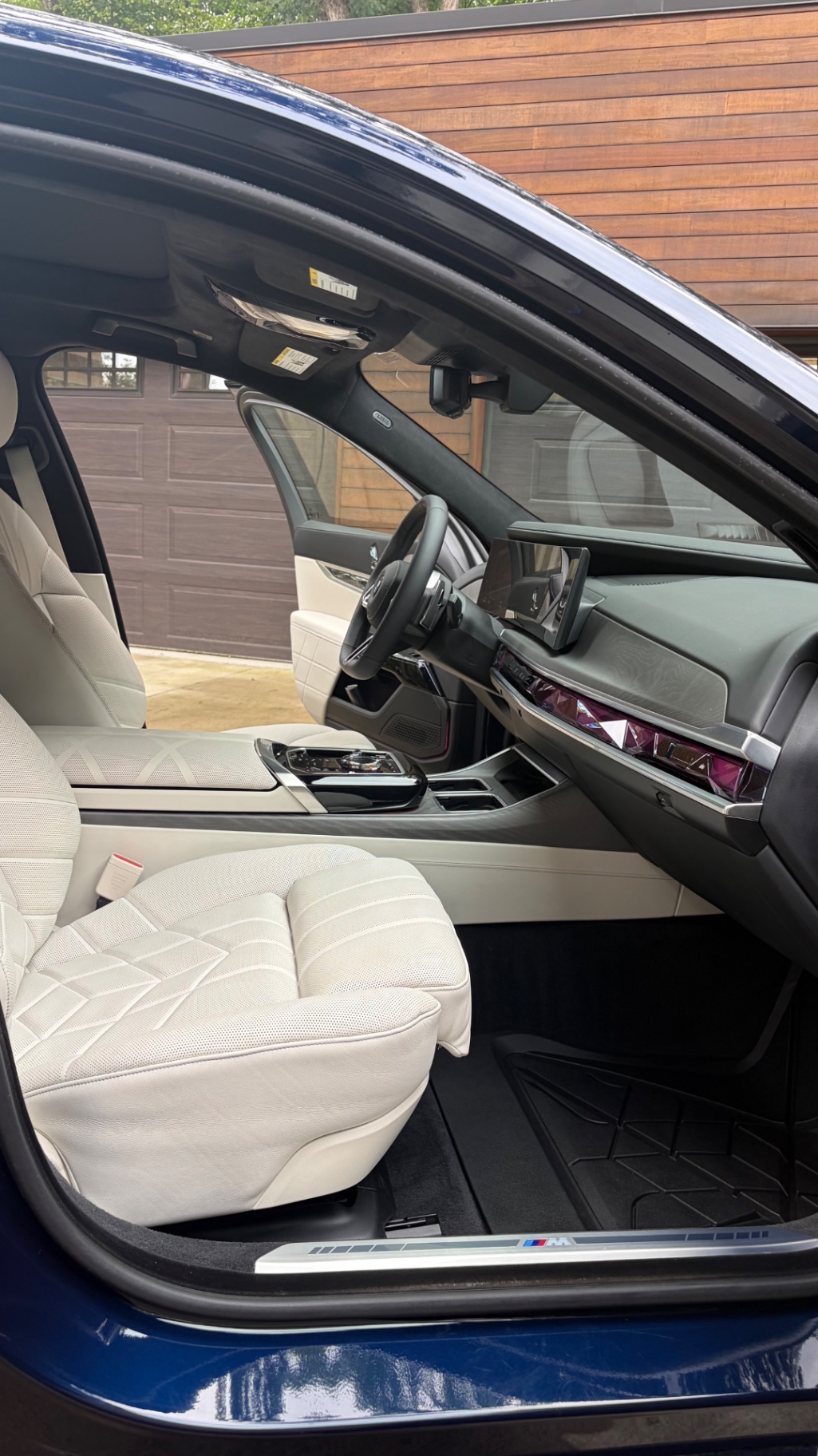 Front seats and cabin of a detailed BMW M760i xDrive