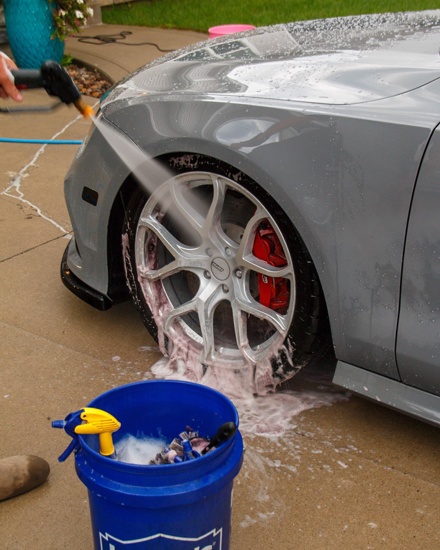 Audi RS7 wheel being decontaminated before paint correction