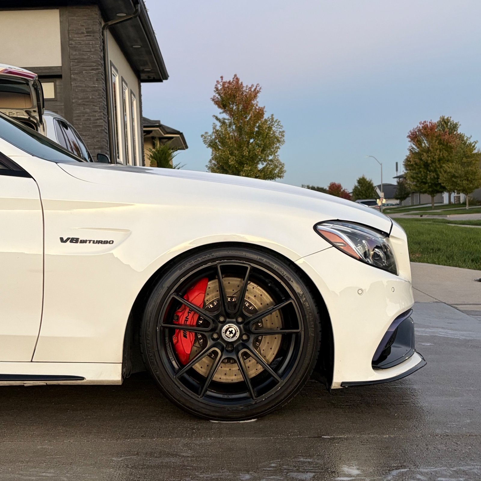 Close view of the HRE wheel and AMG brake on the white C 63 S in Waukee