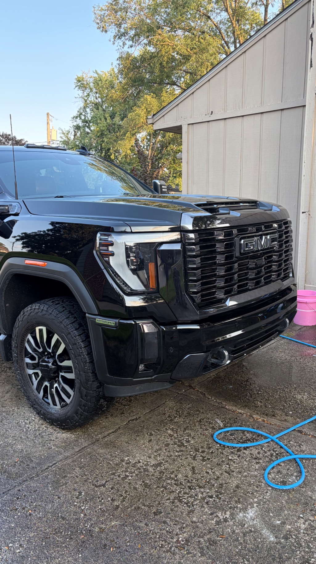 Front grille and headlight detail on a GMC Sierra 2500 Denali Ultimate