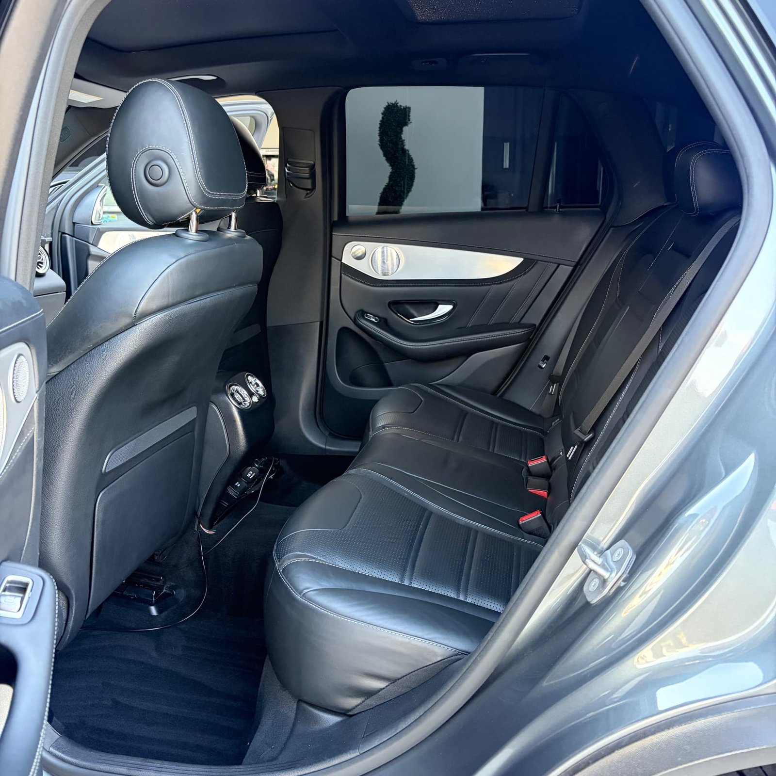 Detailed black leather rear seats of the Mercedes-AMG GLC 63