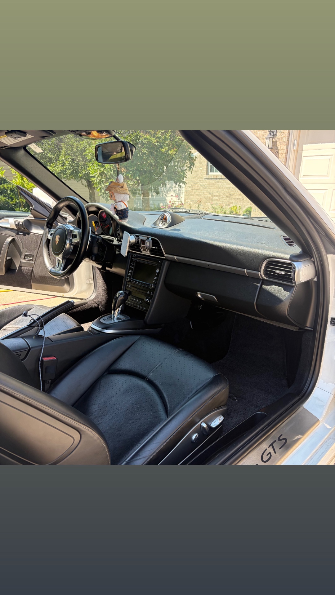 Interior cabin of a Porsche 911 Carrera GTS Cabriolet after detailing