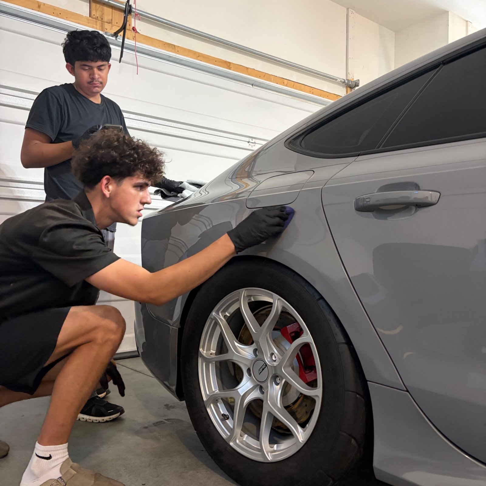 Two-step paint correction on an Audi RS7 rear quarter