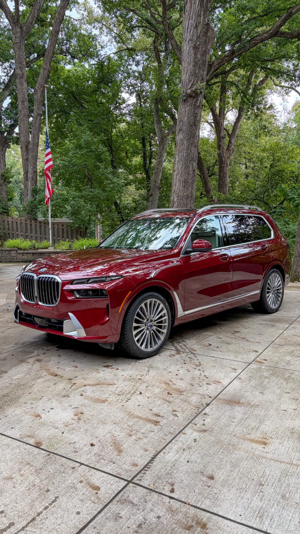 BMW Individual X7 in Aventurine Red after a mobile premium full detail in Des Moines, Iowa